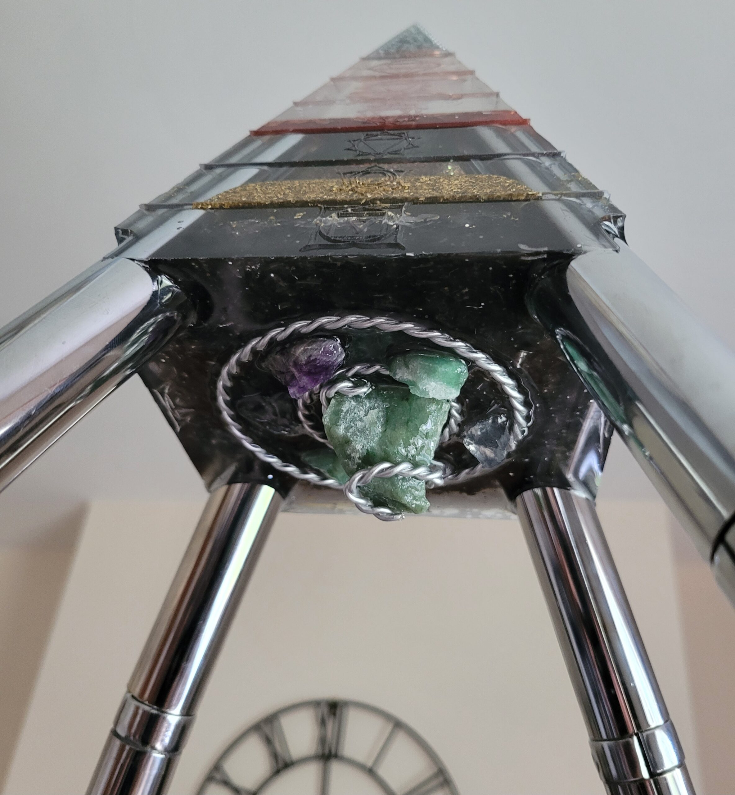 chrome and orgonite meditation pyramid