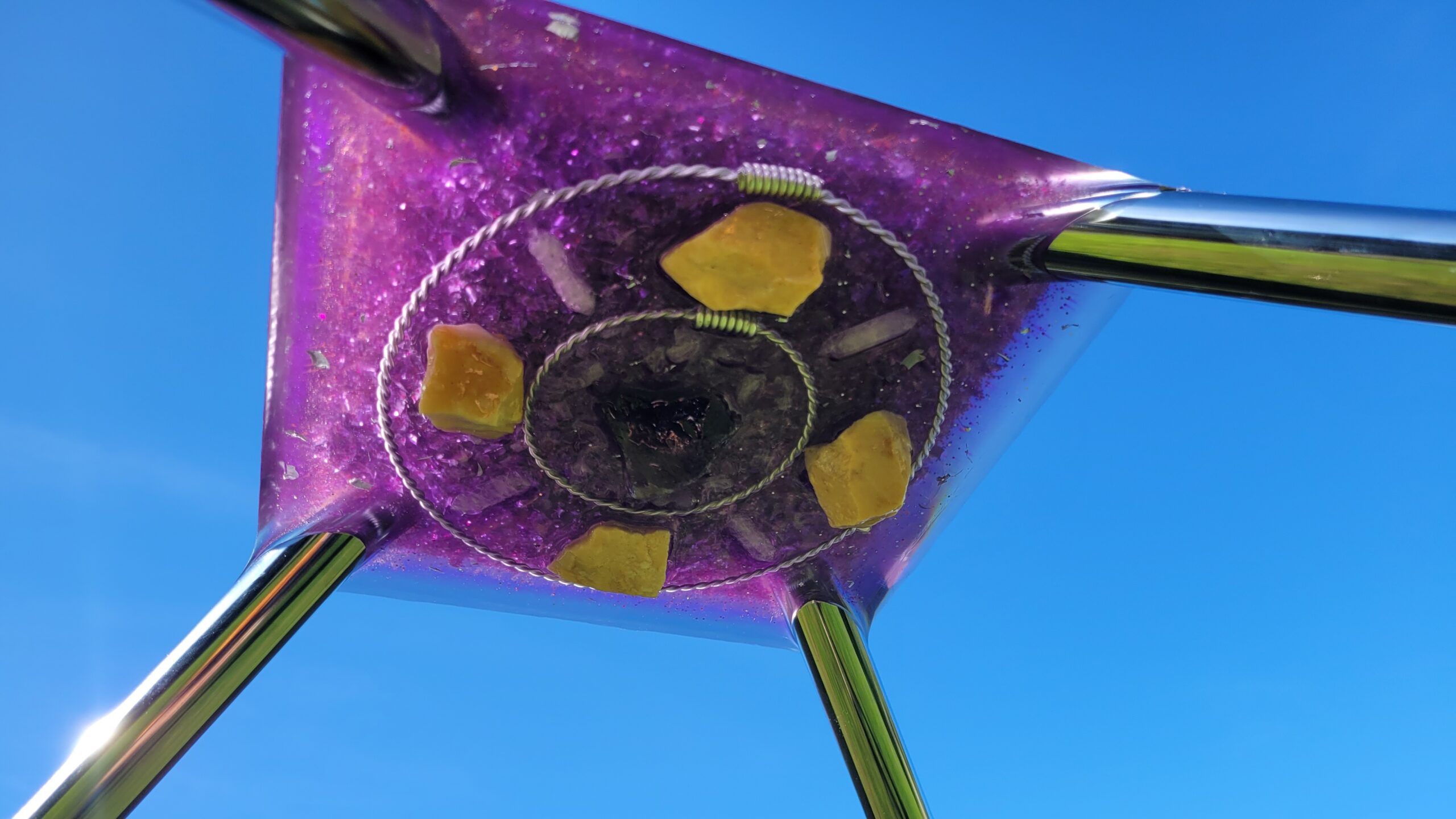 crystals on the bottom of a outdoor meditation pyramid